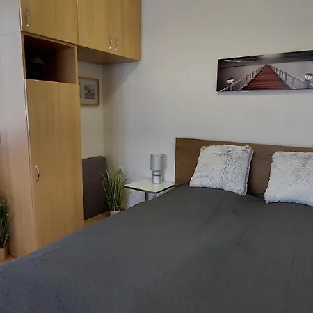 Beszédes-lak, Aranypart Apartman